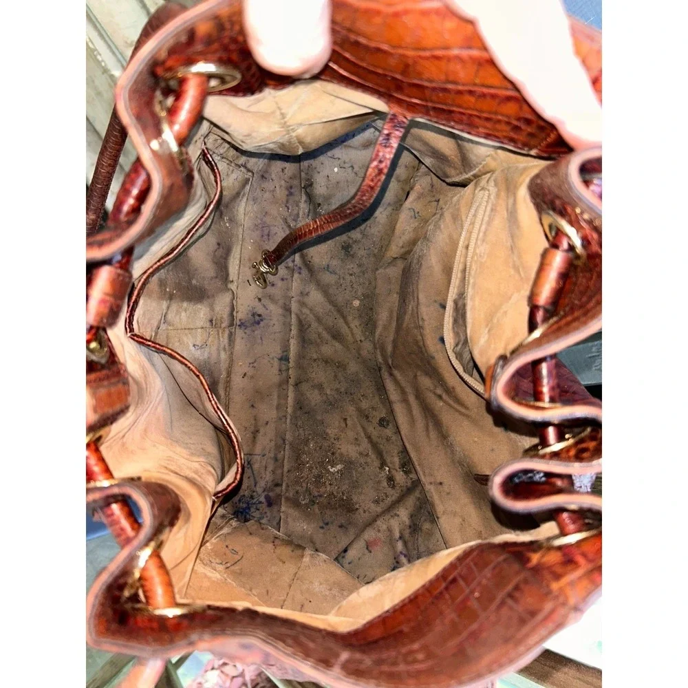 brown Brahmin bucket bag features croc-embossed leather